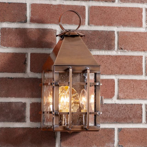The comforting design allows the Barn Light to add light and warmth to a variety of architectural style homes. With clean lines and solid metal construction, the lanterns will last a lifetime. Available in antique copper or solid weathered brass. Five year guarantee.