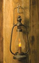Black Metal Lantern is lightly distressed and features a grungy LED taper candle that can be switched on or switched to timer mode. The lantern is 12" high. Visit website for FREE s/h & discount offers. Primitive Country Farmhouse Decor.