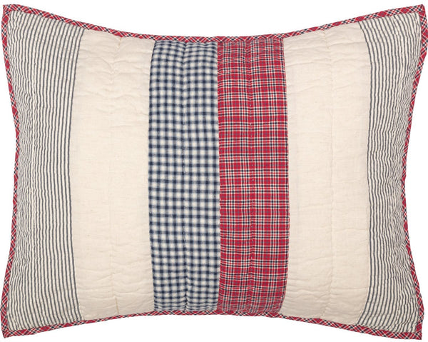 Hatteras Patch Standard Sham 21x27, Seersucker fabric in classic patchwork are united in American red, cotton white, and denim blue - all pieced together in a mix of square and rectangular patchwork. Primitive Country Farmhouse Bedding Home Decor.