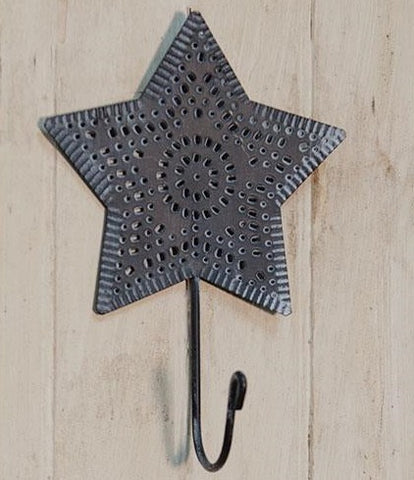 Punched Metal Star Hook has a single metal hook and measures 8" high by 5" wide.  Finish has a weathered look.