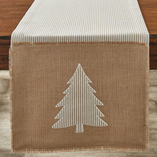 Wintery white and tan stripe is paired with soft burlap and pine tree to give the Modern Farmhouse Christmas Table Runner a Christmas inspired look for your modern Christmas table decor. Finished with fringed edges to add a rough spun look of authenticity. 100% cotton.