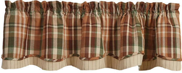 Bring the outdoors inside with this Woodbourne Lined Layered Valance.  Features stunning shades of orange, green, brown, and tan that combine to create a pretty plaid! The striped bottom layer is the perfect finishing touch!