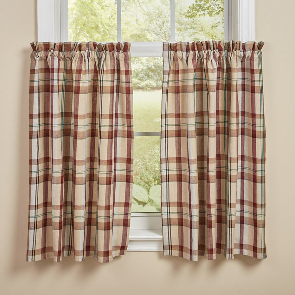 The Gamekeeper Plaid Tiers add a charming touch to your window! Featuring a classic plaid design in tones of antique white, tan, red, green, and black, these tiers will be a stylish accent to your decor!