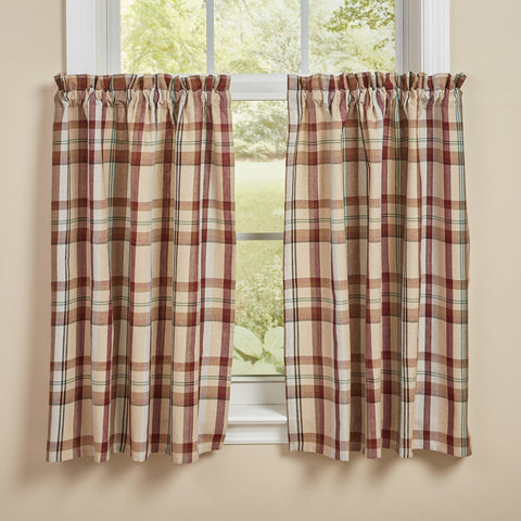 The Gamekeeper Plaid Tiers add a charming touch to your window! Featuring a classic plaid design in tones of antique white, tan, red, green, and black, these tiers will be a stylish accent to your decor!