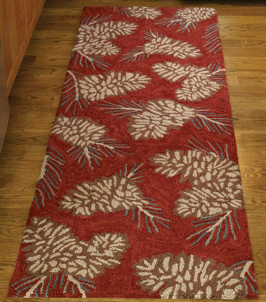 Bring the outdoors into your home with the lively Pinecone Hooked Rug Runner! The rich red base provides a pop of color with the classic pinecone design! Available in 2 sizes!