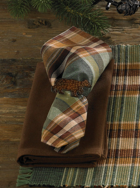 These Wood River Napkins offer a comfy, outdoorsy appeal! Featuring an earthy blend of chocolate, tans & greens that work together to create a simply beautiful plaid pattern that adds charm & beauty to any decor! So versatile, use throughout your home as an accent mat for your favorite candle/decorative pieces, under a lamp, or wherever your creativity leads you! Pair with Wood River Placemats for the complete look!
