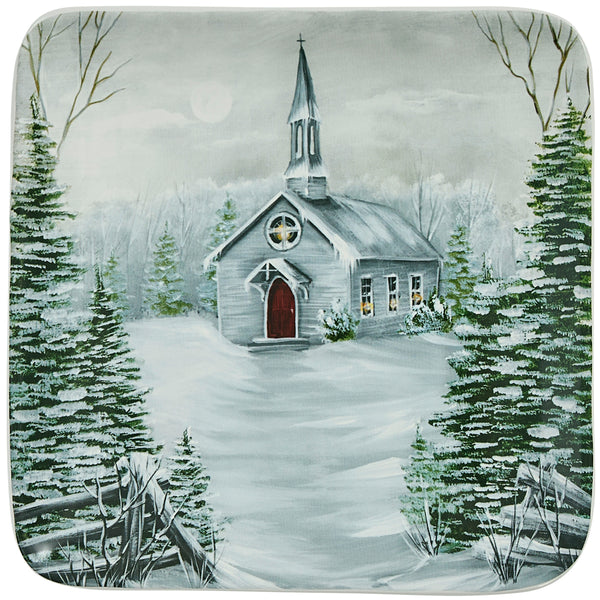 Add a calming and gorgeous touch to your holiday table with the All Is Calm Salad Plates, featuring a serene church in a winter forest! Complete the look with the coordinating mugs, spoon rest, oval platter, cookie jar, soap pump, and salt & pepper set!