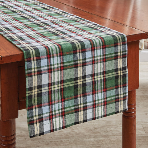 Add a beautiful rustic touch to your table with the Happpy Trails Table Runners! The classic plaid pattern is a timeless way to add style to your kitchen decor! Coordinate with the complementary Happy Trails kitchen linens and curtains for a complete look! Available in two sizes (sold separately).