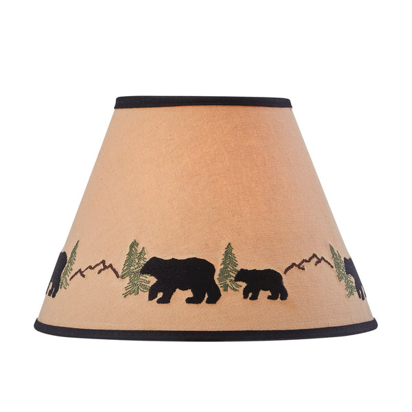 Black Bear Embroidered Shade features an embroidered scene with black bears strolling through the woods and mountains. The shade is crafted from 100% cotton fabric over an opaque backing which is hand trimmed and sewn and has a washer fitting for use with a harp and finial. A perfect addition to a rustic or country home.