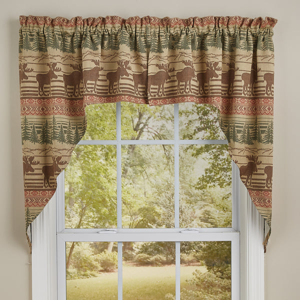 The Moose Jacquard Swags offer a beautiful outdoorsy appeal! Featuring a blend of neutral colors and a pop of red that work together to create a breathtaking scene of moose in their natural habitat, the design is sure to bring the rugged outdoors in! Coordinate with the complementary Moose Jacquard kitchen linens and curtains to complete the look!