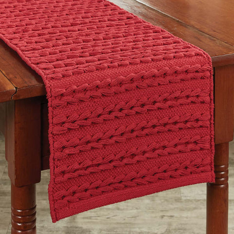 Add a touch of texture while bringing the celebration of the Christmas season to your table with the Winter Magic Scarf Red Table Runners! A gorgeous festive red chunky knit is sure to charm your guests and bring a warm feeling to your holiday decor! The runners come in two different sizes (sold separately).