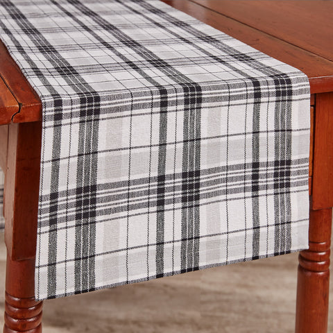Add charming style to your table with the Refined Rustic Table Runners! Featuring a classic plaid design in tones of white, gray, and black, these table runners will be an elegant touch to your country decor! Complete the look with the rest of the Refined Rustic collection! Available in 3 sizes (each sold separately).