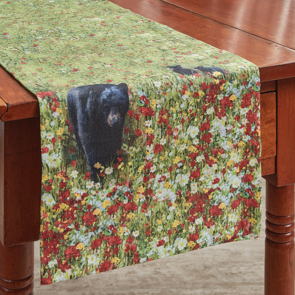 The Hello Bear Table Runner offers a beautiful outdoorsy appeal! The striking colors work together to create a breathtaking scene of mama bear and her babies in their natural habitat! Coordinate with the complementary Hello Bear Valance, Napkins, and Placemats to complete your kitchen's look!