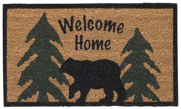 Our Welcome Home Black Bear Doormat will be a wonderful addition to your entryway. Featuring two green pines and a black bear silhouette with the message Welcome Home.  Made from all-natural fibers and hand painted sentiment in colorfast dyes, this doormat is durable and skid resistant. It will be the perfect addition to your decor that can be used year after year.