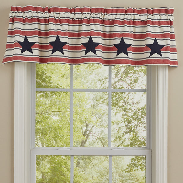 Stars and Stripes Patch Lined Valance! Mimicking Old Glory herself, it epitomizes the American flag in all her glory! Enhance your window with the beloved red, white & blue...not just on July 4th, but all year long!  Specifications  Colors: Darkest Navy, Patriotic Red & White Dimensions: 60'' L X 14 '' W