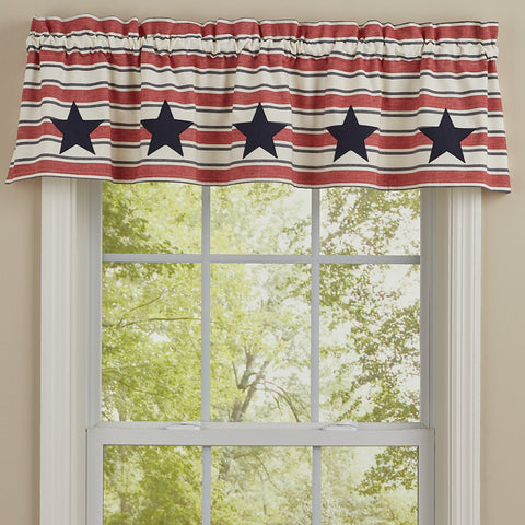 Stars and Stripes Patch Lined Valance! Mimicking Old Glory herself, it epitomizes the American flag in all her glory! Enhance your window with the beloved red, white & blue...not just on July 4th, but all year long!  Specifications  Colors: Darkest Navy, Patriotic Red & White Dimensions: 60'' L X 14 '' W