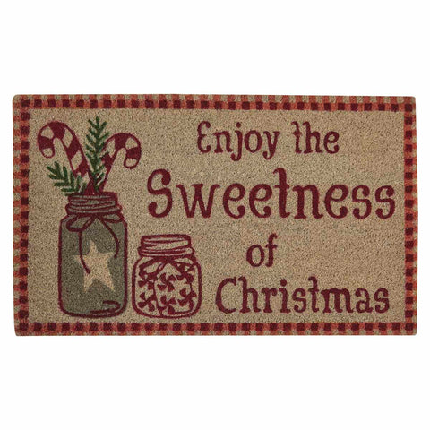 Our Mason and Peppermint Doormat will liven up your entryway and add a festive welcome to your home.  Featuring two mason jars filled with candy canes and peppermints with the words Enjoy the Sweetness of Christmas.