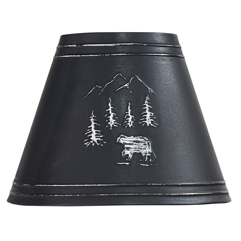 Black Bear Embossed Metal Lampshade features an embossed scene with a black bear strolling through the woods and mountains. The shade is crafted from metal, adding a rustic touch to your outdoorsy decor. Pair with the matching 10" lampshade and 14" lampshade to complete the ensemble! Check out our coordinating Black Bear Utensil Caddy and Black Bear Canisters, also!