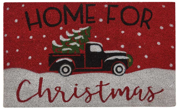HOME FOR CHRISTMAS DOORMATThis Home for Christmas Doormat will liven up your entryway and add festive welcome to your home.  Featuring a classic old truck hauling a tree