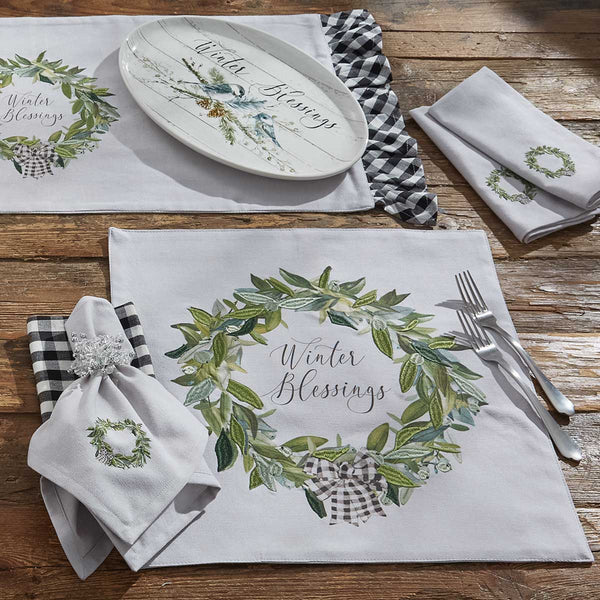 Bring the celebration and magic of the season to your table with the Winter Blessings Placemats! A gorgeous festive wreath design surrounds the charming lettering! Sure to charm your guests!