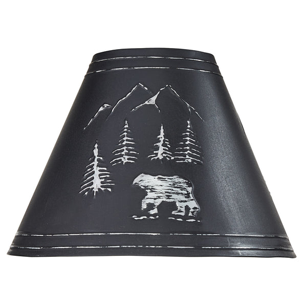 Black Bear Embossed Metal Lampshade features an embossed scene with a black bear strolling through the woods and mountains. The shade is crafted from metal, adding a rustic touch to your outdoorsy decor. Pair with the matching 10" lampshade and 14" lampshade to complete the ensemble! Check out our coordinating Black Bear Utensil Caddy and Black Bear Canisters, also!