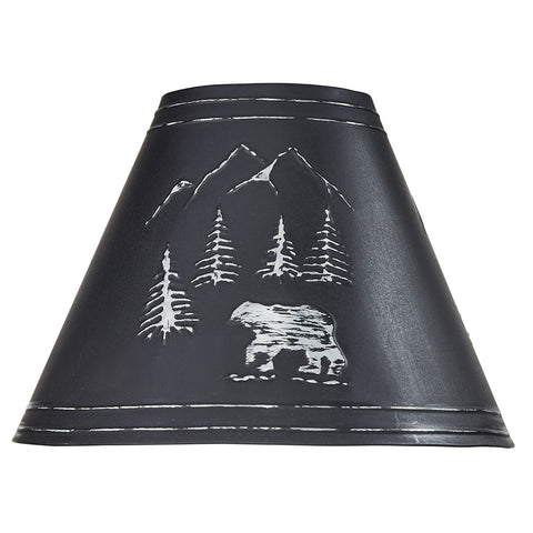 Black Bear Embossed Metal Lampshade features an embossed scene with a black bear strolling through the woods and mountains. The shade is crafted from metal, adding a rustic touch to your outdoorsy decor. Pair with the matching 10" lampshade and 14" lampshade to complete the ensemble! Check out our coordinating Black Bear Utensil Caddy and Black Bear Canisters, also!