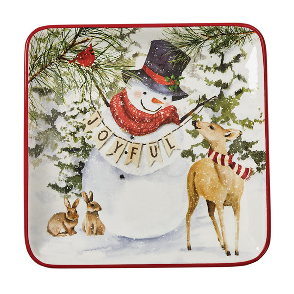 Add a fun and charming holiday accent to your table with the Flurry Friends Salad Plates! Featuring a jolly snowman with his furry friends, these plates are sure to make memorable holiday meals! Pair with the Flurry Friends Mugs for a complete look (as pictured / sold separately)!