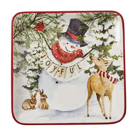 Add a fun and charming holiday accent to your table with the Flurry Friends Salad Plates! Featuring a jolly snowman with his furry friends, these plates are sure to make memorable holiday meals! Pair with the Flurry Friends Mugs for a complete look (as pictured / sold separately)!