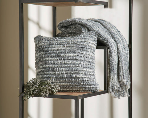 Warm and cuddly, the Chunny Throw Gray will pair perfectly with a variety of color schemes!