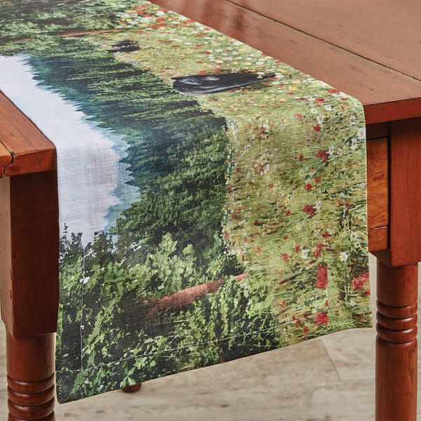 The Hello Bear Table Runner offers a beautiful outdoorsy appeal! The striking colors work together to create a breathtaking scene of mama bear and her babies in their natural habitat! Coordinate with the complementary Hello Bear Valance, Napkins, and Placemats to complete your kitchen's look!