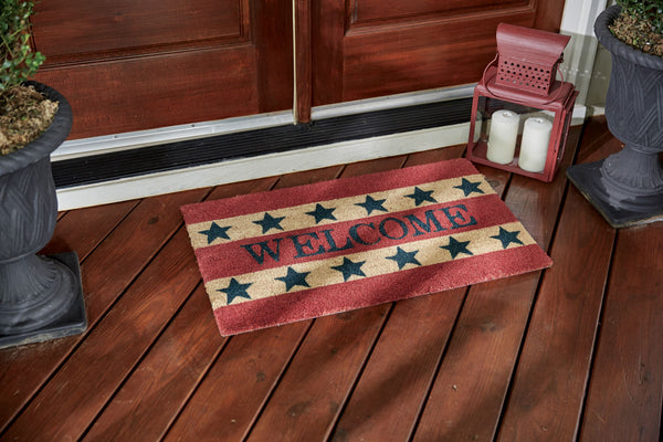 Our Welcome Americana Doormat will be a wonderful patriotic addition to your entryway. Featuring red and white stripes, blue stars, and the word Welcome.