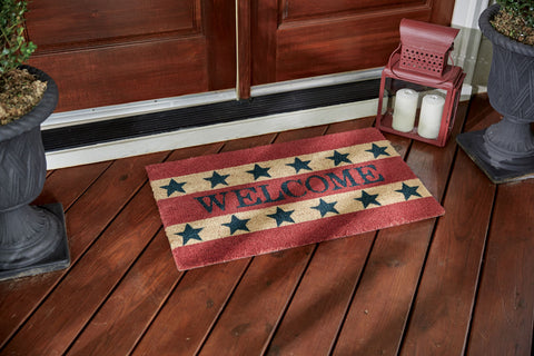 Our Welcome Americana Doormat will be a wonderful patriotic addition to your entryway. Featuring red and white stripes, blue stars, and the word Welcome.