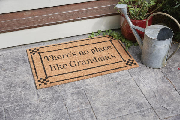 Our No Place Like Grandmas Doormat will be a wonderful addition to your entryway. Cornered with black checkered pattern the message reads There's No Place Like Grandma's.