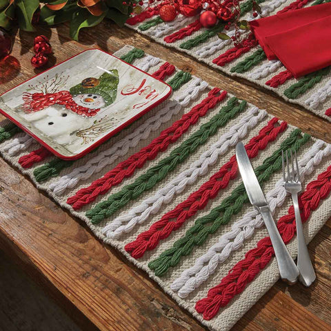 Bring the celebration of the Christmas season to your table with the Winter Magic Scarf Multi Placemats! A gorgeous festive red, green, and candlelight white chunky knit is sure to charm your guests and bring a warm feeling to your holiday decor!