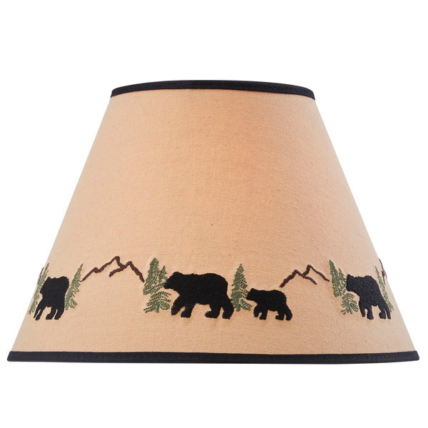 Black Bear Embroidered Shade features an embroidered scene with black bears strolling through the woods and mountains. The shade is crafted from 100% cotton fabric over an opaque backing which is hand trimmed and sewn and has a washer fitting for use with a harp and finial. A perfect addition to a rustic or country home. 