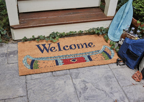 Our Canoe Doormat will liven up your entryway and add warm welcome to your home.  Features a tribal printed canoe across the bottom with the word Welcome printed above.