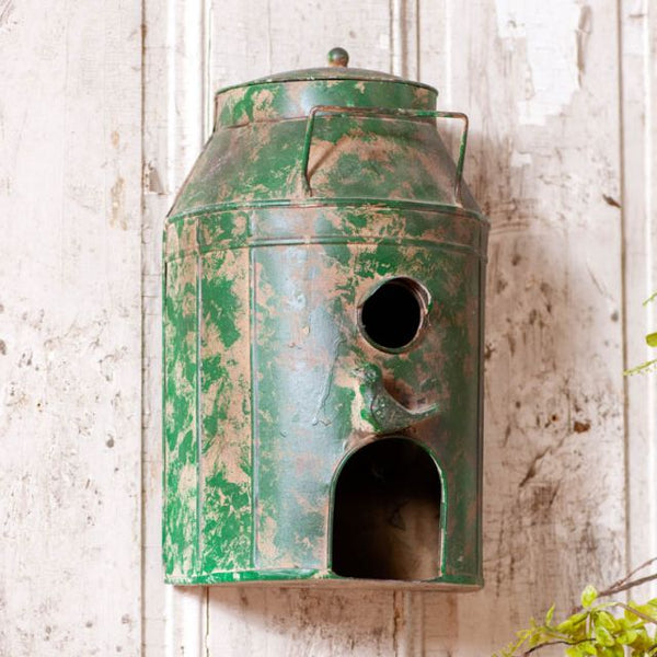 Our Metal Rustic Milk Can Birdhouse is made of galvanized metal with a rustic green finish. A hole in the back allows it to be easily hung on a wall and is perfect decorating accessory for your patio, lawn, or garden. Primitive Country Farmhouse Home Decor.