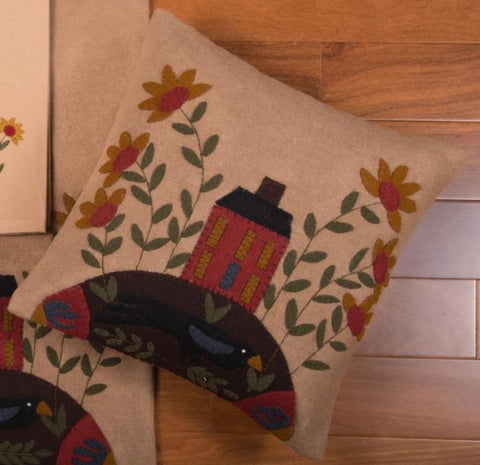 The In The Country Nutmeg Pillow is just as cute as can be!  Featuring a red saltbox house nestled between tall flowers. The pillow is made of wool and felt that measures 14" x 14". This pillow comes FILLED. Visit website for FREE s/h & discount offers. Primitive Country Farmhouse Home Decor.