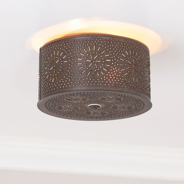 Lovingly crafted by hand, our Round Pierced Ceiling Light is the perfect lighting accent. This fixture creates a cozy country atmosphere in your home. Direct wired with two E26/Medium (Standard) sockets, 25 watts max. per socket. Decorative light only. Kettle Black finish. Handcrafted in Pennsylvania. This light is UL-CUL listed and has a 5 year guarantee.
