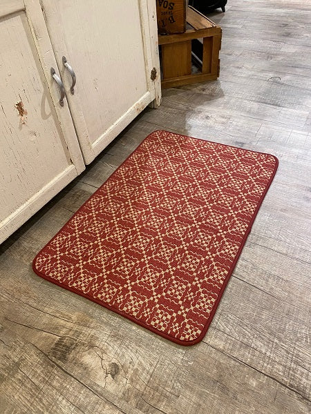 Red and Linen. Fabric is a blend of 70% cotton and 30% acrylic.&nbsp;&nbsp; Approx: 18" x 30", sizes may very slightly Rug includes rubber backing. See website for free shipping offer. Primitive Country Home Decor.