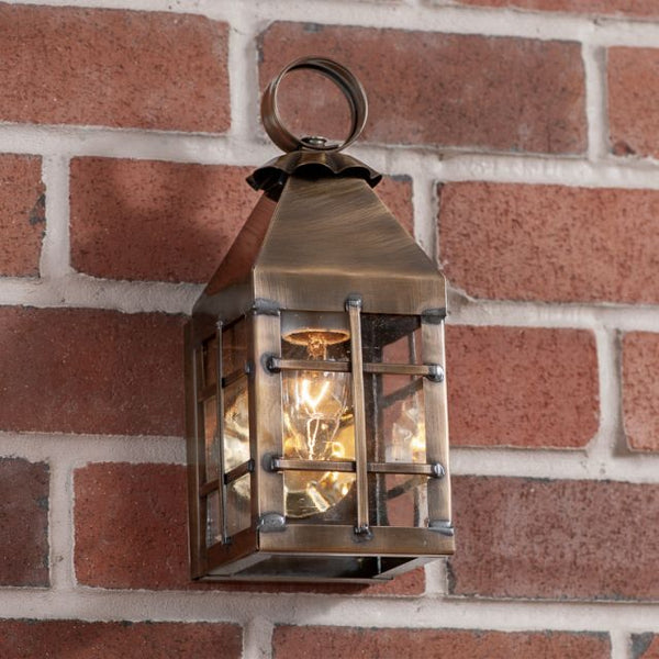 Glowing with warmth, our Small Wall Lantern when placed on each side of your front entry door provides a welcome for friends and family. This versatile lantern is also great for back doors, decks, and patios. Five year guarantee.