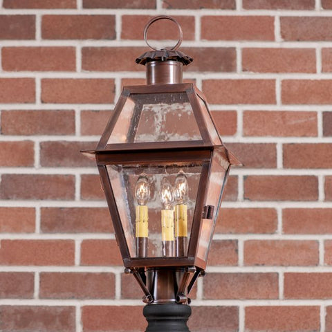 This beautifully crafted Town Crier Outdoor Post Light with bars will enhance the beauty of your home. The historic glass adds to the splendor of this light. Five year guarantee.