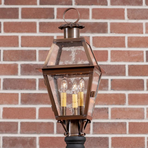 This beautifully crafted Town Crier Outdoor Post Light with bars will enhance the beauty of your home. The historic glass adds to the splendor of this light. Five year guarantee.