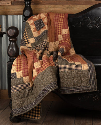 Hand-quilted 60x50 Maisie Throw with courthouse step blocks, stars, and ditsy florals in burgundy, black, and tan. 100% cotton, reversible, primitive country style.