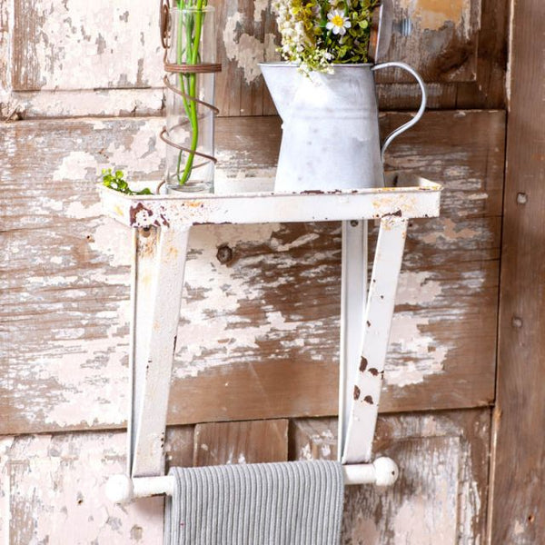 Vintage Towel Rack - Ships for FREE! Measures 12.5-Inches high and 12-Inches wide and 5-Inches deep Distressed Vintage White Solid metal construction Florals and accessories shown on piece not included. Primitive Country Farmhouse home decor.