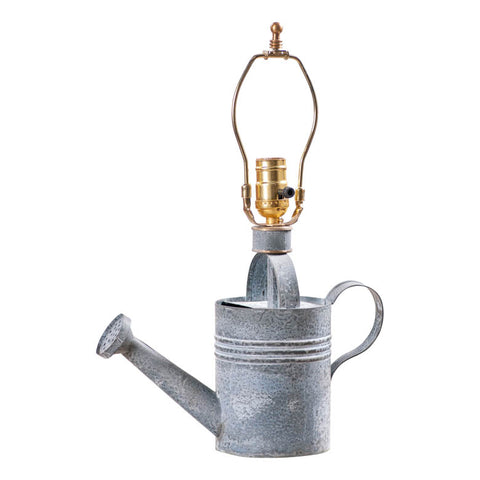 Add some vintage flair to your sunroom or any room of your country cottage or farmhouse with this lovely Watering Can Lamp Base. The solid metal watering can base with the aged gray finish looks like it was pulled from some garden in the past. This gorgeous little lamp base will surely brighten up your day, just add a shade and you're ready to go. So pour a little light into your life and buy this Vintage Watering Can Lamp today!