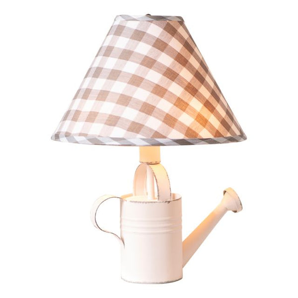 Add some vintage flair to your sunroom or any room of your country cottage or farmhouse with this lovely Watering Can Lamp with Shade. Combined with the gray check fabric shade and you have a gorgeous little lamp that will surely brighten up your day. So pour a little light into your life and buy this Vintage Watering Can Lamp with Shade today!