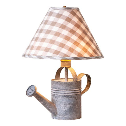 Add some vintage flair to your sunroom or any room of your country cottage or farmhouse with this lovely Watering Can Lamp with Shade. Combined with the gray check fabric shade and you have a gorgeous little lamp that will surely brighten up your day. So pour a little light into your life and buy this Vintage Watering Can Lamp with Shade today!